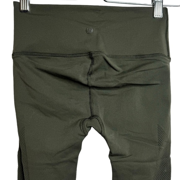 Lululemon Reveal Crop Dark Olive Green Mesh Panels Stretchy Leggings XS - Picture 7 of 13